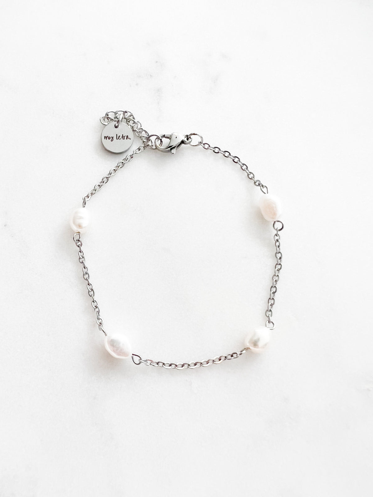 Cable armband með perlum